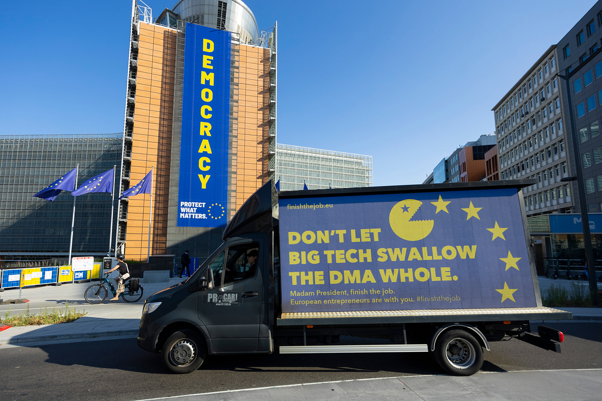 Don't let Big Tech swallow the DMA whole — mobile billboard in front of the European Commission.